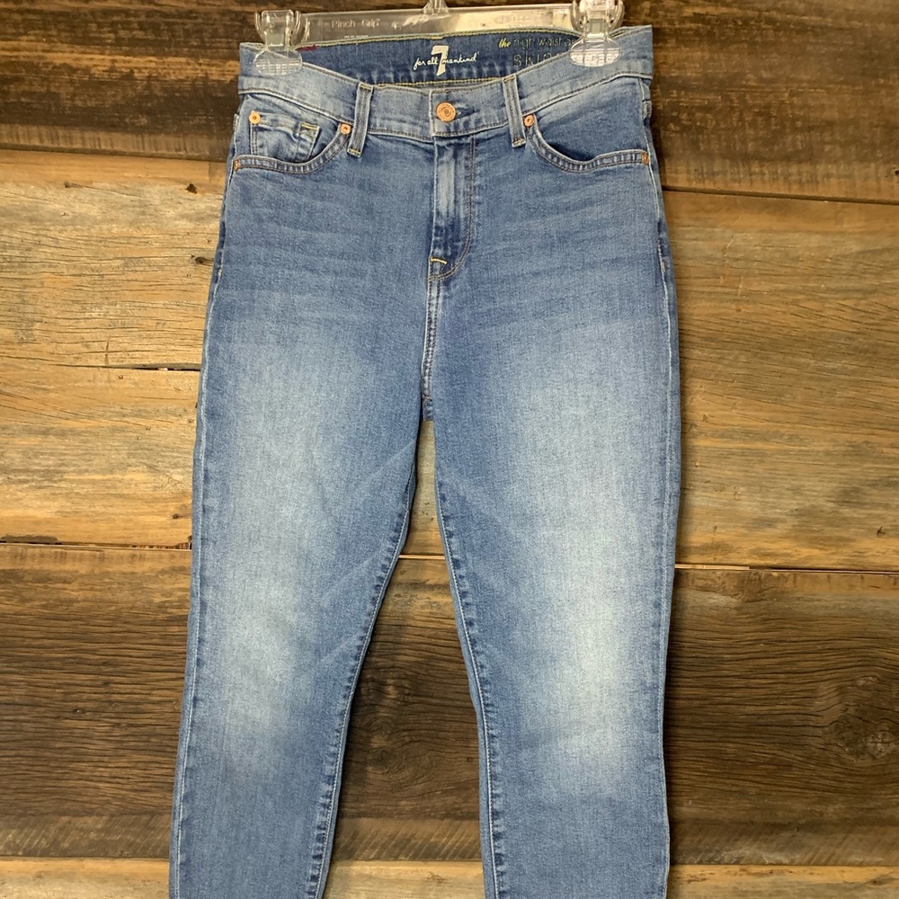 Light Wash Distressed Blue Jeans
